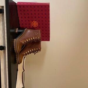 Tory Burch boots!! These boots have never been worn super cute and comfortable.